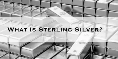 Close-up of sterling silver surface with engraved text — differences between sterling silver and pure silver