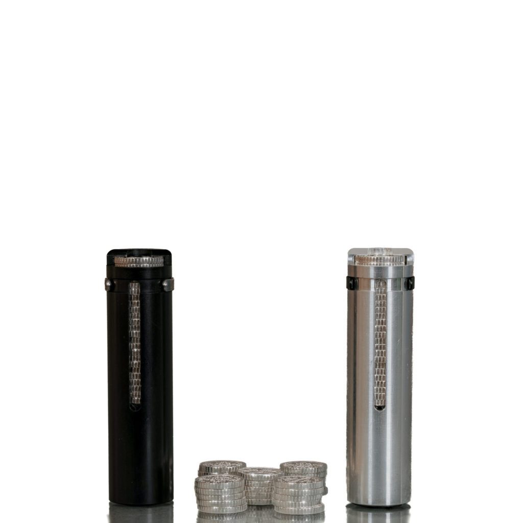 Black and silver coin tubes with stacked coins